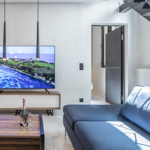 Snuggle up for an evening of movies in the comfy and stylish living area