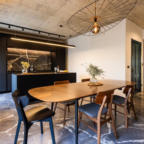 Gather around the large dining table for a home-cooked meal