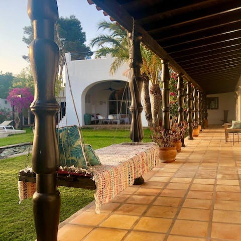 Read a book on the hanging bed on the veranda