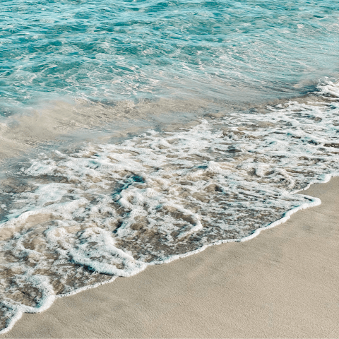 Take a leisurely walk to Port des Torrent Beach 