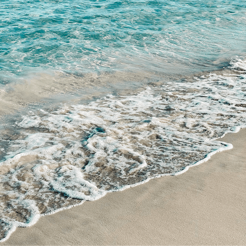 Take a leisurely walk to Port des Torrent Beach