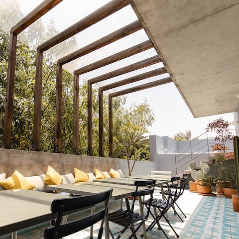 Meet friends on the rooftop terrace