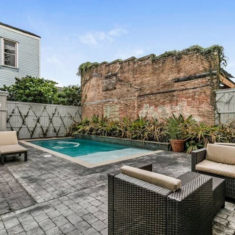 While away sunny hours in the communal pool, just a one-minute walk from your door