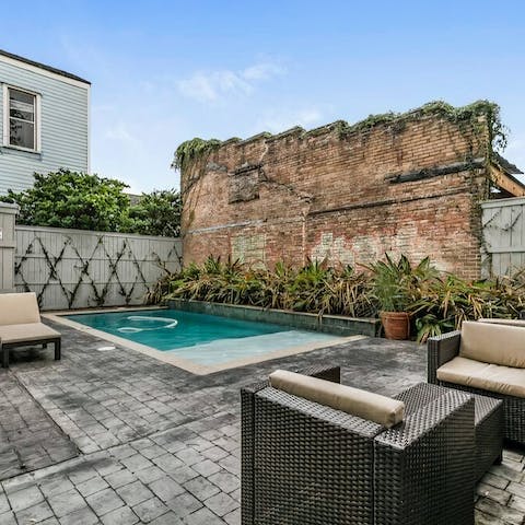 While away sunny hours in the communal pool, just a one-minute walk from your door