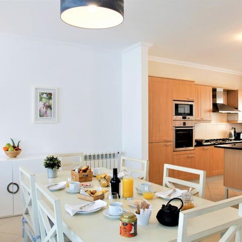 Sit down for a group breakfast in the open kitchen and dining area