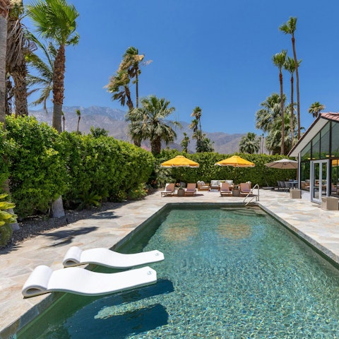 Admire the beautiful mountain vistas from the pool