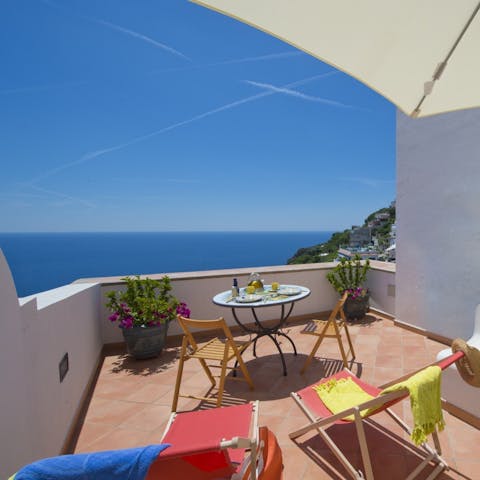 Enjoy your morning coffee as you gaze out at the ocean view