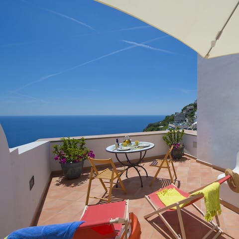 Enjoy your morning coffee as you gaze out at the ocean view