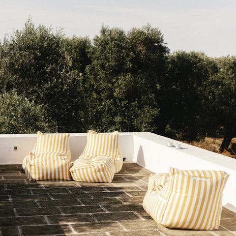 Relax on the roof terrace with a coffee or cocktail