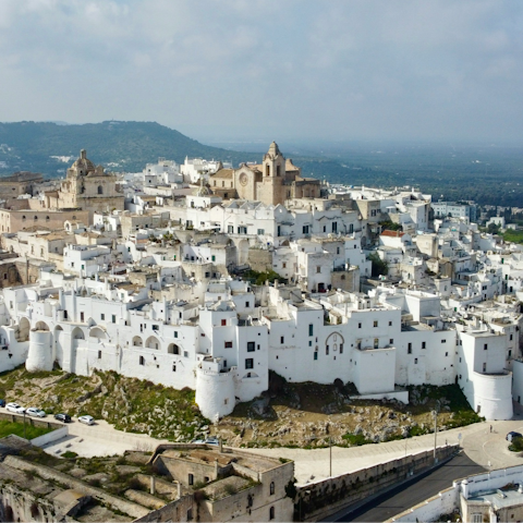 Visit nearby Ostuni to explore its white-washed streets