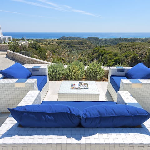 Enjoy drinks on your private terrace with views over the sea