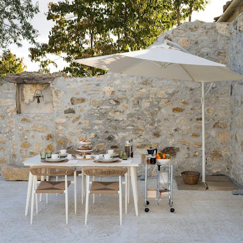 Sit down for an alfresco dinner as the sun sets