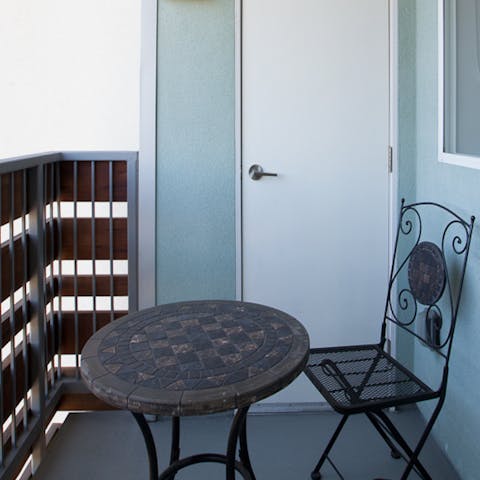 Chill out on the small but private balcony
