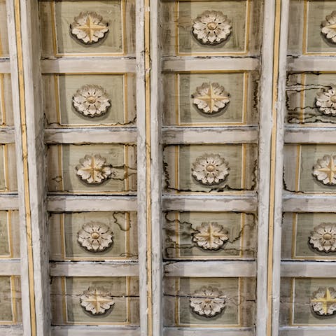 Admire the vaulted wooden ceiling