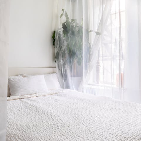 Enjoy a restful night in the serene bedroom area