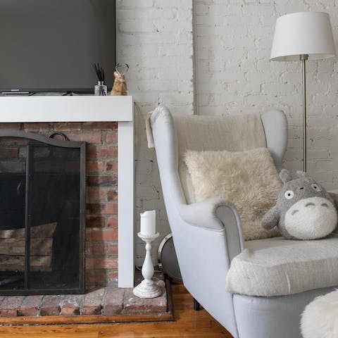 Nestle into the winged armchair with your favourite book