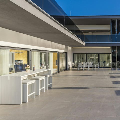 Gather for magical sunset drinks on the terrace