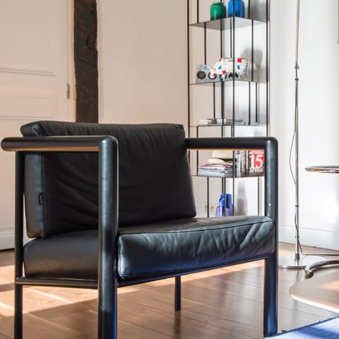 Brutalist armchair in black leather