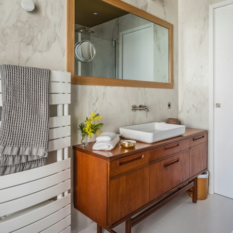 Repurposed vintage sideboard in the bathroom