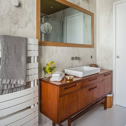 Repurposed vintage sideboard in the bathroom