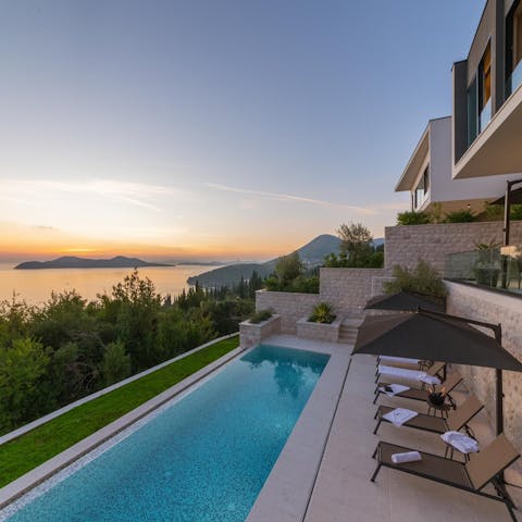 Watch the sunset by your pool as you enjoy an aperitif