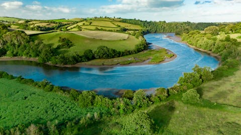 Walk along the River Dart for fifty minutes and finish up in Totnes for a pub lunch
