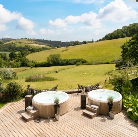 Sit back in the warmth of one of the hot tubs and savour the view of the south Devon countryside