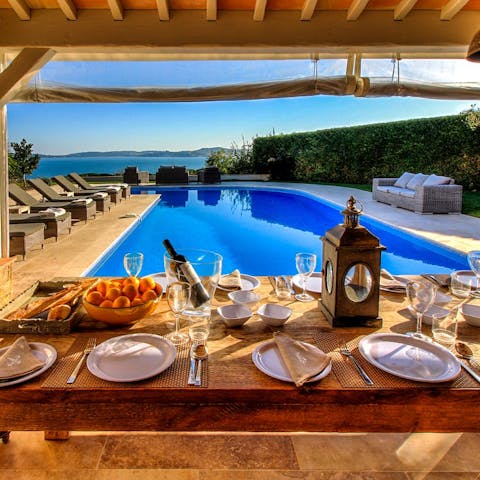 Enjoy dinner on the terrace as the sun goes down