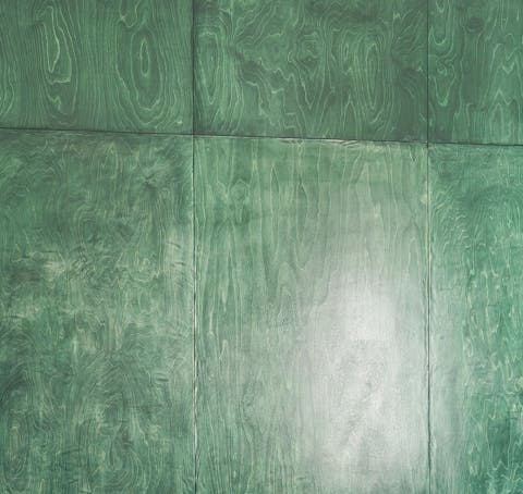 The stained wooden partition