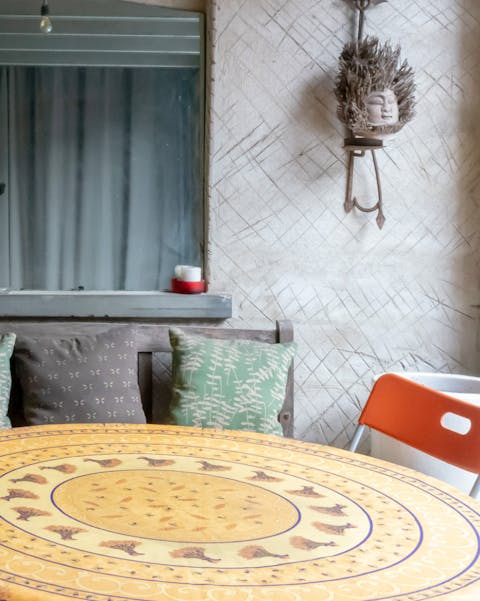 Enjoy a glass of wine in the quaint backyard patio area