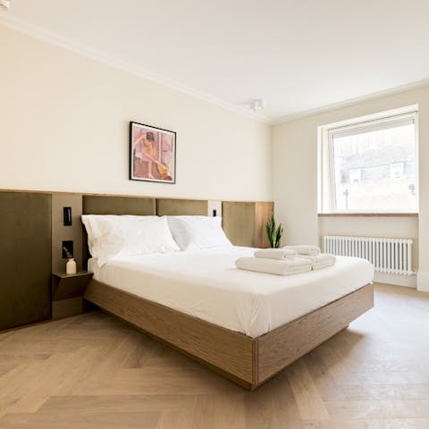 Wake up feeling refreshed in the elegant bedroom