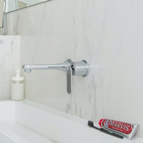 Spotless marble bathroom with modern fixtures