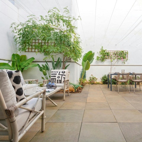 Have a chilled glass of tinto de verano in the large courtyard