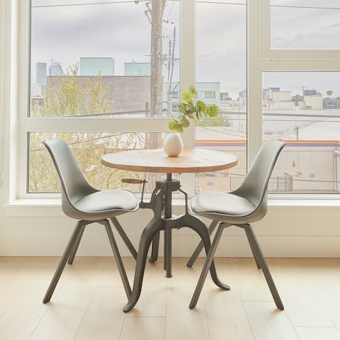 Start your morning with coffee at the sunny breakfast table