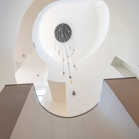 Admire the sculptural architecture of this beautiful home