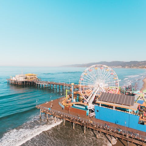 Plan a day trip to Santa Monica, around twenty five minutes away by car