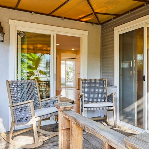 Sip iced tea from the comfort of a rocking chair on the home's terrace
