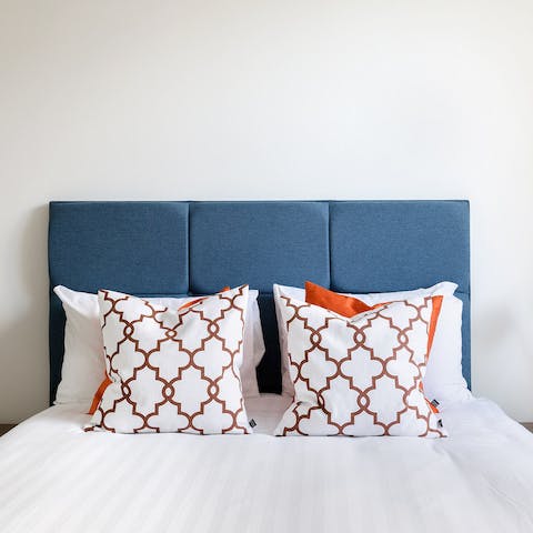 Sleep like a baby in the stylish bedrooms, adorned with luxury linens