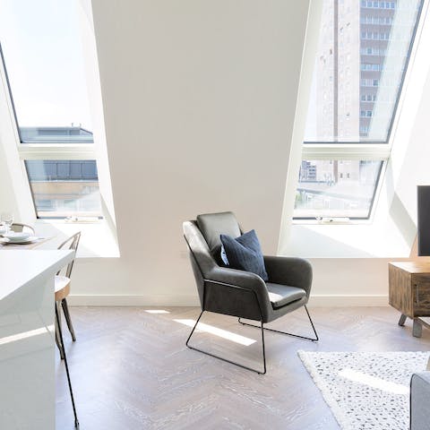 Bask in the natural light flooding through metre-long windows