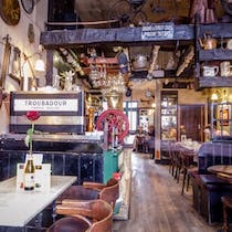 Cosy up for a bite at the Troubadour