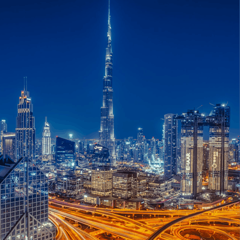 Dive into the buzz of Downtown, just a short taxi drive away