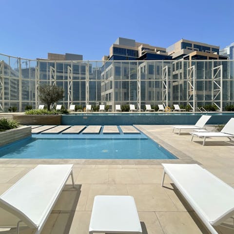 Beat the desert heat in the stylish, shared swimming pool