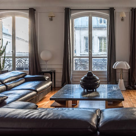 Lounge in stylish interiors inspired by Early 20th century design