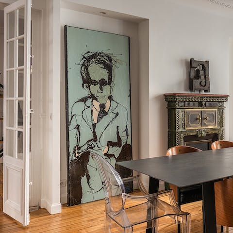 Admire the host's cool art collection