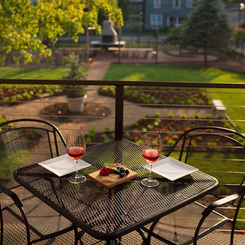 Enjoy an aperitif on the balcony as the sun goes down