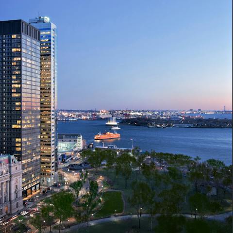 Enjoy the views of the open water and Governors Island beyond