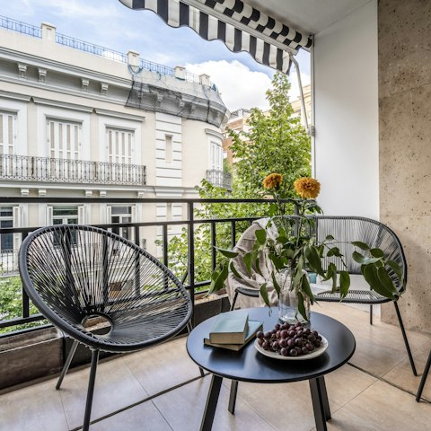 Sip sangria on the private balcony as the sun sets