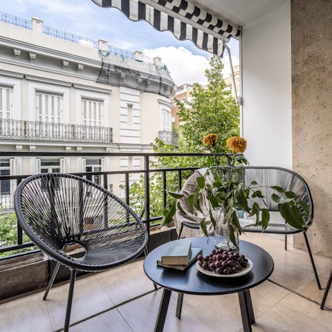 Sip sangria on the private balcony as the sun sets