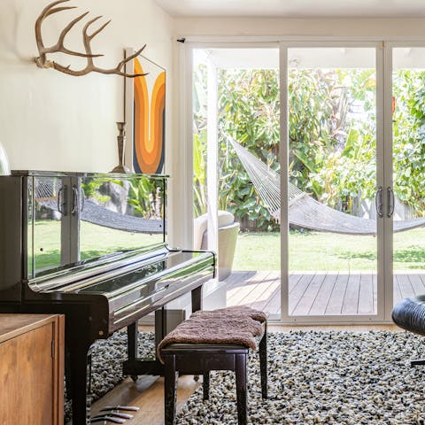 Try your hand at the piano overlooking the garden