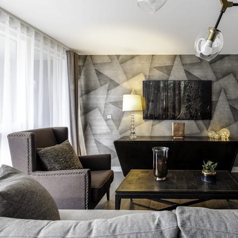 Lounge on the comfortable sofa and put something you love on TV